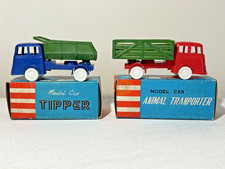 TELSALDA TYPE / WOOLBRO  PLASTIC  TRUCKS  X  2    HONG KONG MIB