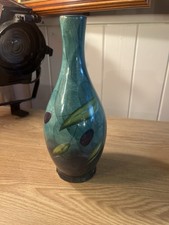vase with a dragonfly and