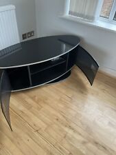 black oval swivel tv cabinet