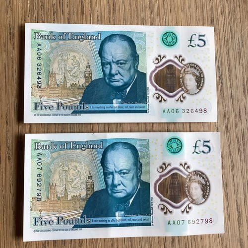 Pair five pound polymer note - five,