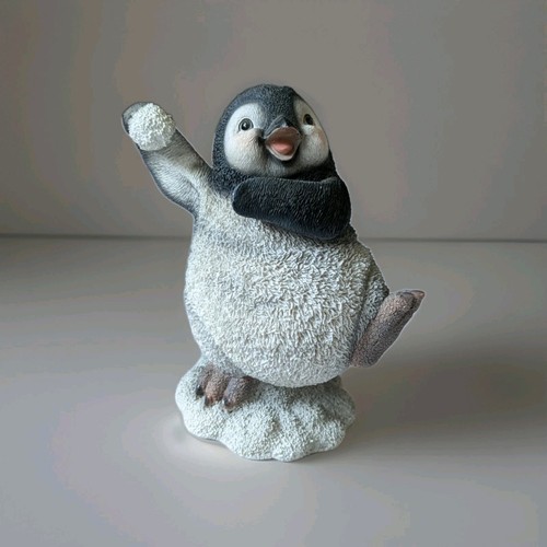 Snowballing penguin resin - penguin,