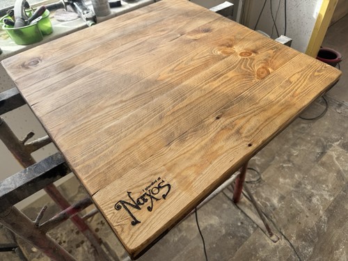 Cafe table tops branded with - table,