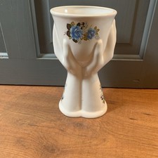 Vintage Hand Holding  Vase