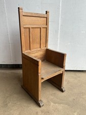 An early 20th century oak church elder’s chair