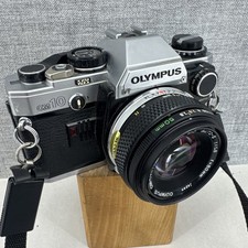 Olympus OM10 35mm SLR Camera &