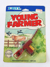 1987 ERTL DIECAST YOUNG FARMER - 1/64 SCALE - RED HAY BALER - MOSC