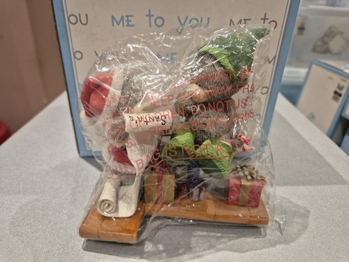 You bear figurine santas - to,