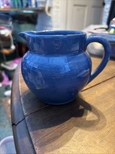Small Blue Milk Jug With Chip On The Rim 9cm Tall