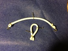 vintage action man restringing kit elastics and hooks to hold head and arms