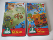 2 x Early Learning Fuzzy Felt sets in storage tins. Felt Fairies and Felt House.