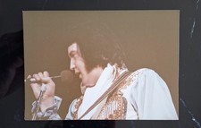 An original excellent concert photo of Elvis Presley. Date and stamp/ reverse.