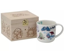 Mug/hot water bottle