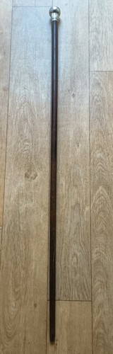Antique dress cane featuring - dress, a