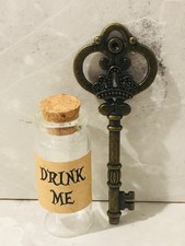 ALICE IN WONDERLAND DRINK ME