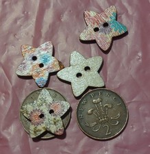 2 Packs of 50 Star Shaped Buttons in Each Pack, Wooden multicoloured patterned.