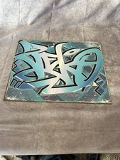 Grafiti Art Over Old Beer Sign