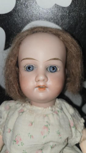 Haunted doll antique girl - haunted,