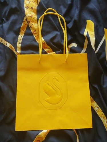 Swarovski yellow paper gift - swarovski,