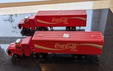 C) Coca Cola 2 X Gorgi 1885.Trucks , Unboxed