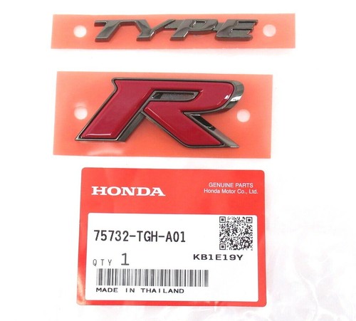 Front grille emblem - front,