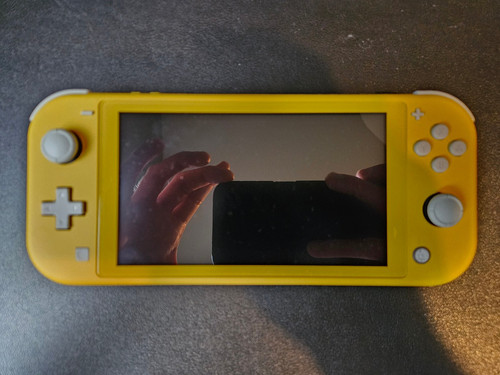 Nintendo switch lite yellow - nintendo,