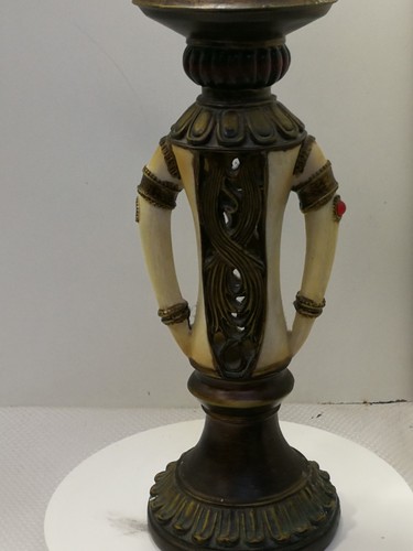 Elephant tusk candle holder