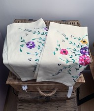 Pair of hand-embroidered