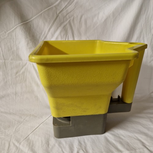 Hand held lawn seed - held,