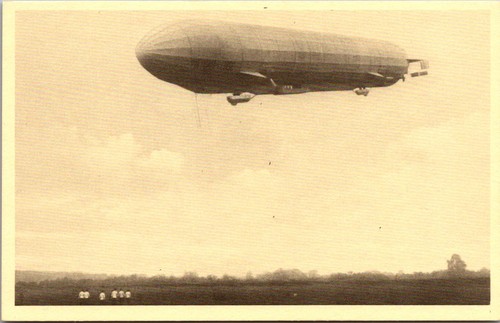 Airship flying above field - flying,