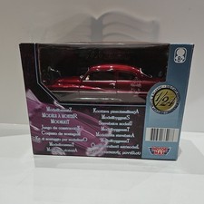 1949 Mercury in metallic red