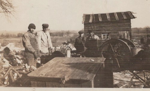 1920s four men circular saw - four,
