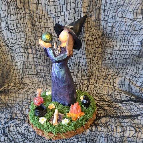 Ceramic witch holding ball - ceramic,
