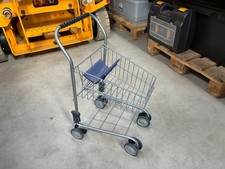 Childs toy shopping trolley