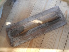 Vintage solid pine concrete float, 12" long.