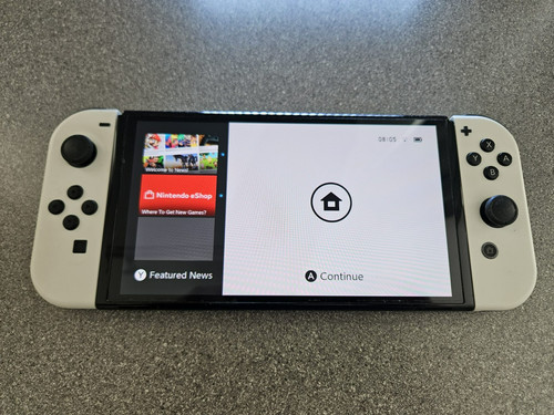 Nintendo switch oled 64gb - nintendo,
