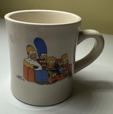 The Simpsons Coffee/Tea Mug Sitting On Couch Stoneware TYPO Cup