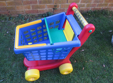 Battat Children's large shopping trolley. Removeable basket. Seat for teddy/doll