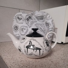RARE METRO SHAPED TEAPOT