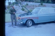1965 35mm Slide Man checking