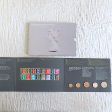 THE UBIQUITOUS ART OF ARNOLD MACHIN 40TH ANNIVERSARY COIN AND STAMP SET -