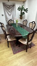 wooden dinning table and 5 chairs