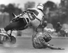 Kawasaki rider Freddie Spencer trying to avoid a fallen rider at a- Old Photo