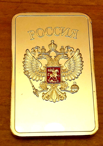 Gold bar ingot globe logo - globe,