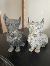 A Vintage Pair Of Cast Iron West Highland Terrier Dogs.