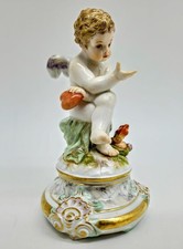 Antique 19th Century Meissen Cupid Cherub Seated Figurine Holding Heart