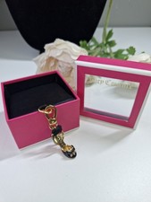 Juicy Couture Gold tone shoe