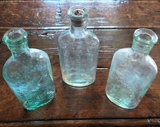3 VINTAGE BOTTLES Glass