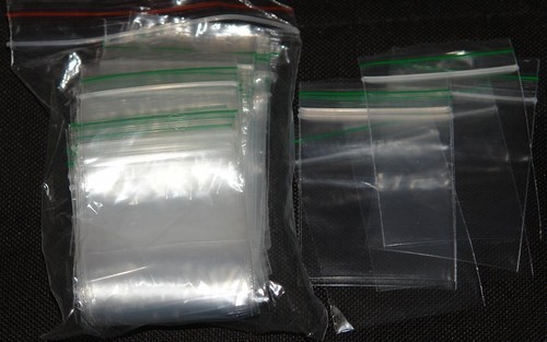 100x small clear button bags - 100x,