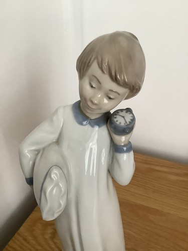 Lladro nao boy with clock - lladro,