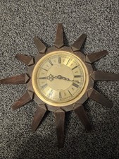 Vintage sunburst wall clock by